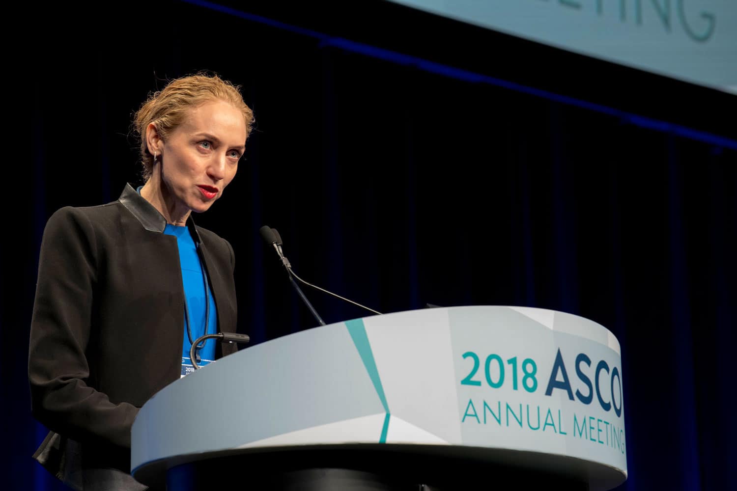 Georgina Long speaking at ASCO18