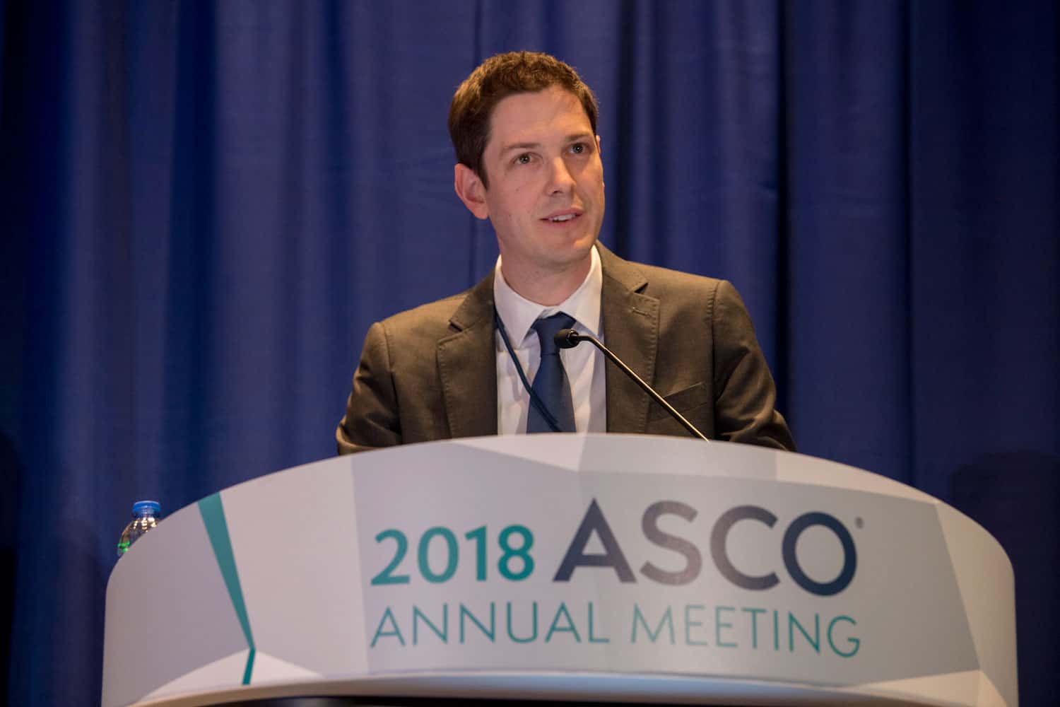 Alexander Menzies speaking at ASCO18