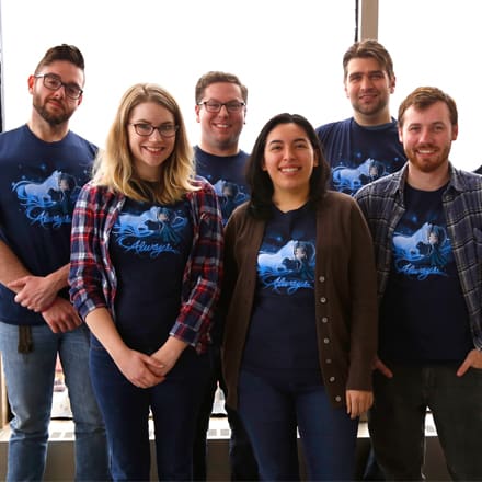 TeeTurtle employees wearing their Harry Potter-themed charity tees