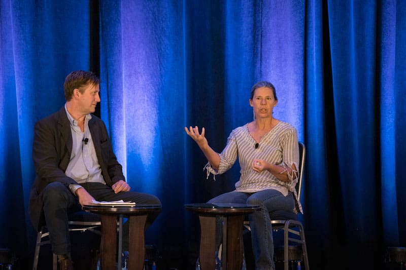 Metastatic breast cancer veteran Judy Perkins in conversation with journalist Charles Graeber at IO360 in 2019. Photo by Arthur Brodsky