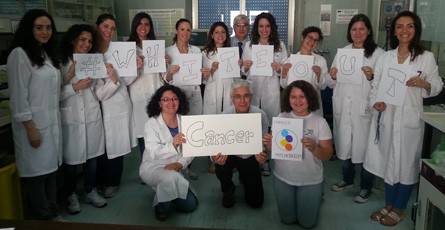 Luigi Istituto Tumori Buonaguro Lab team wears their lab coats in the fight against cancer for White Out Cancer Day 2015