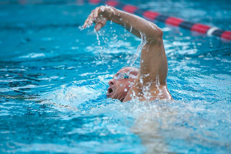 CRI Fundraiser David J. Miller swimming