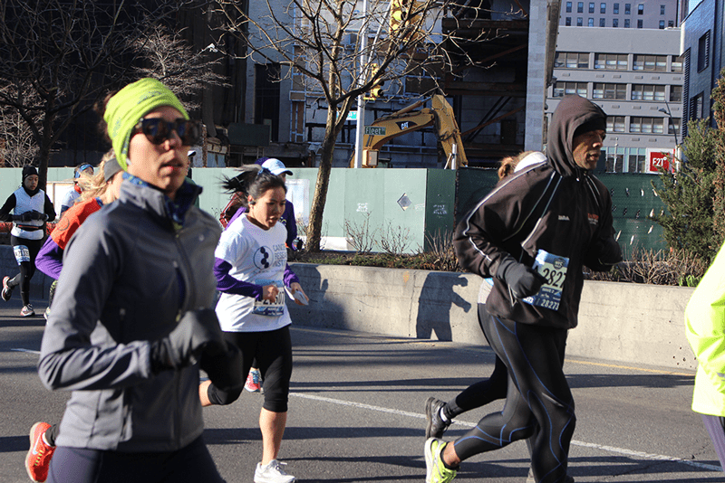 Sarah Santos runs the 2018 NYC Half Marathon.