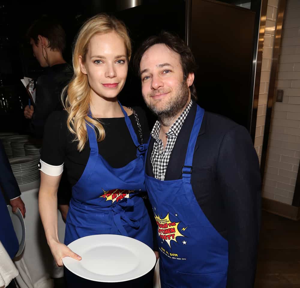 Caitlin Mehner and Danny Strong in aprons to go Through the Kitchen.