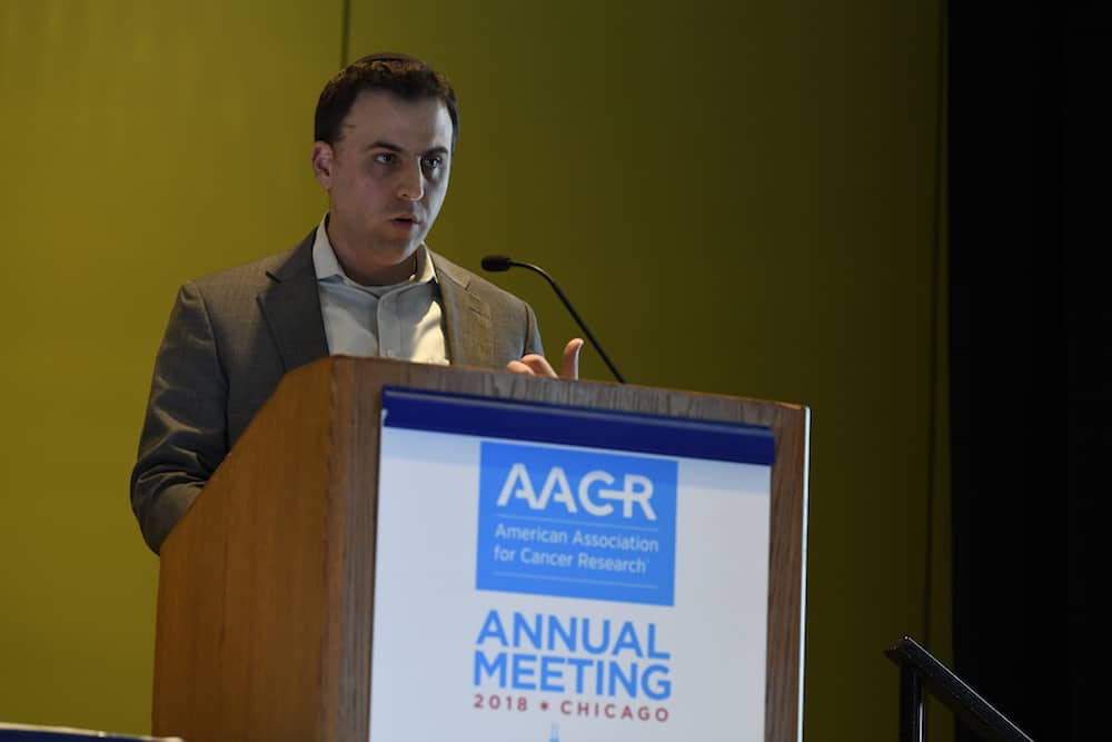 Danny Khalil, MD, PhD, speaking at AACR18