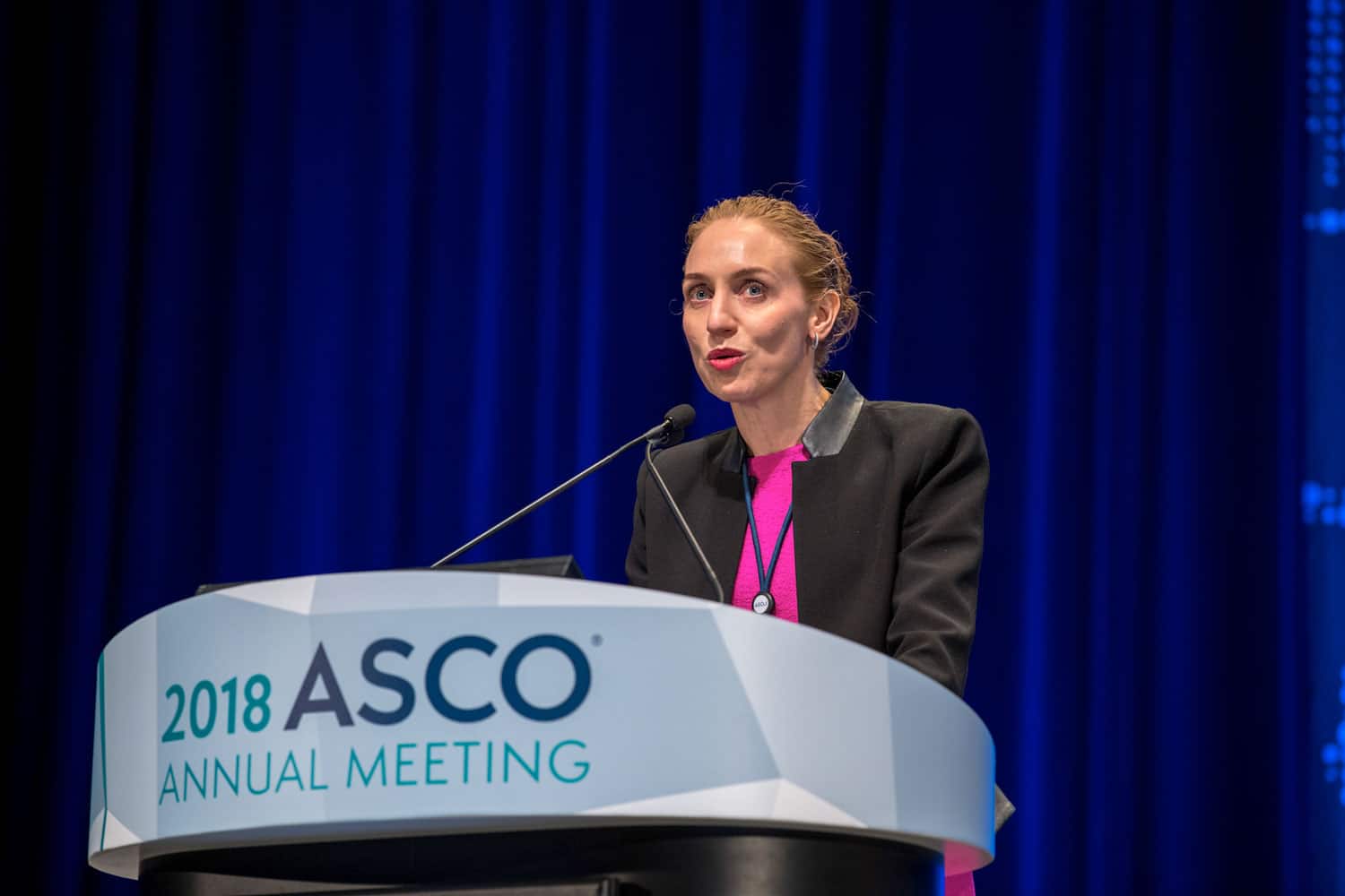 Georgina Long speaking at ASCO18