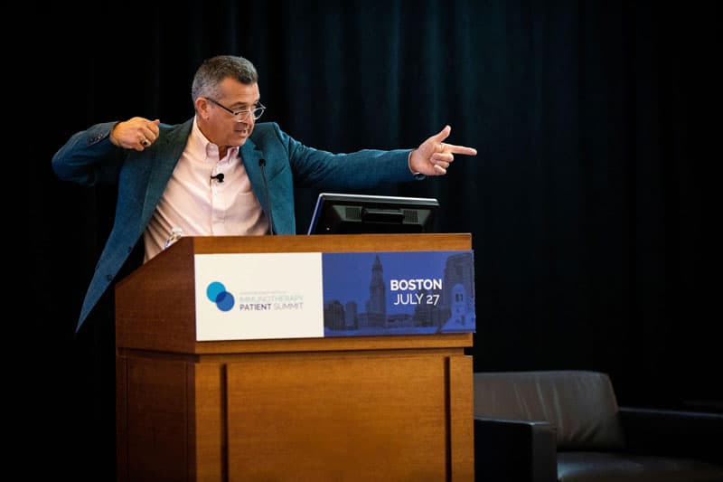 Dr. David Reardon explains during his immunotherapy basics presentation how immune cells operate like trained assassins with specific targets. Photo by Adrianne Mathiowetz.