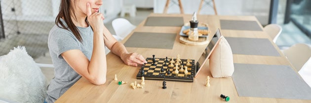 woman playing chess