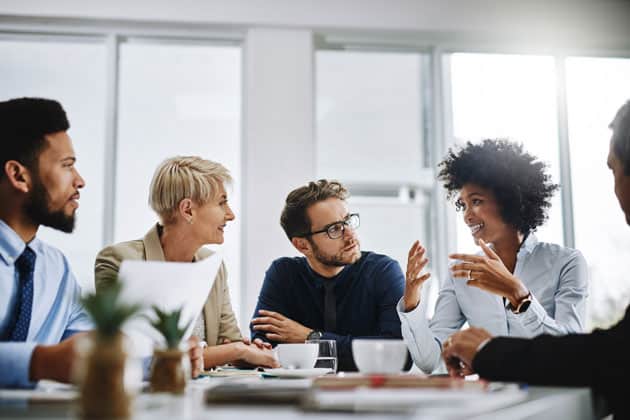 5 people participate in a corporate meeting