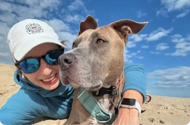 Cute dog and a woman
