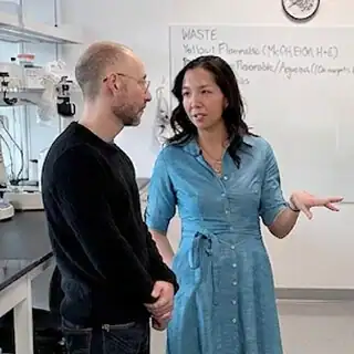 two people in discussion